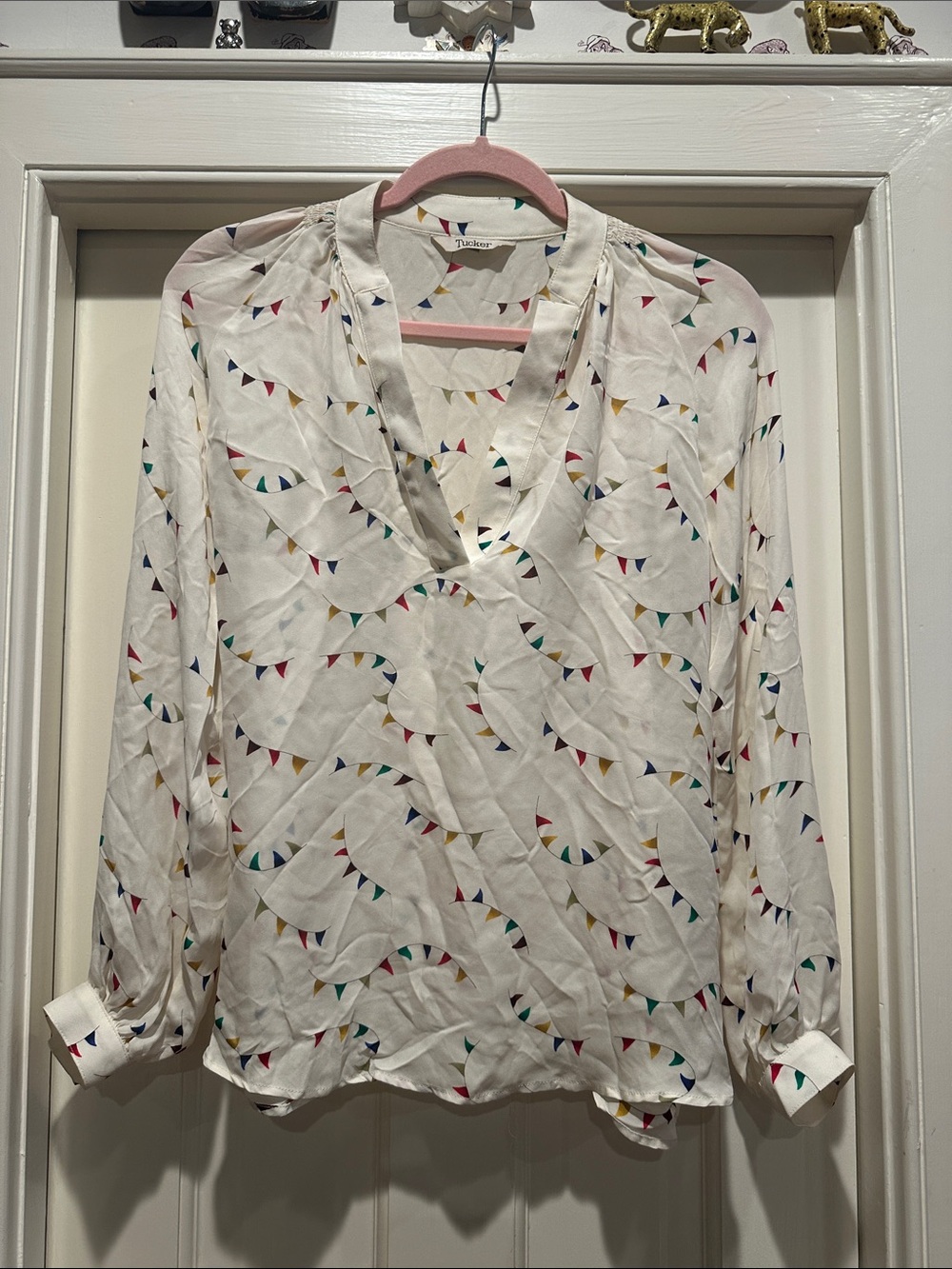 Tucker Ivory Blouse with Multicolor Triangle Banner Print
